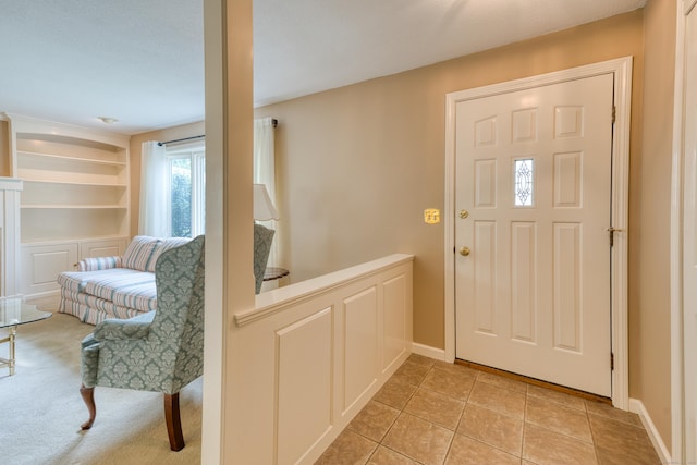 18 Black Birch Rd, Plainville, CT 06062 - entryway with baseboards and light tile patterned flooring