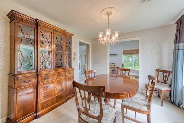 18 Black Birch Rd, Plainville, CT 06062 - dining space with light colored carpet and a chandelier