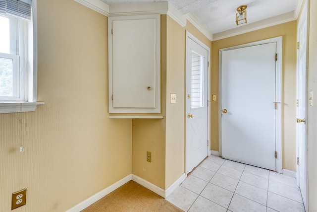 18 Black Birch Rd, Plainville, CT 06062 - foyer featuring light tile patterned floors and crown molding