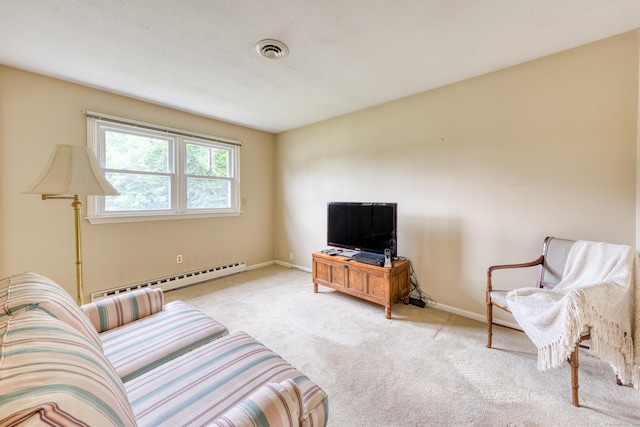 18 Black Birch Rd, Plainville, CT 06062 - living area featuring a baseboard heating unit and carpet flooring
