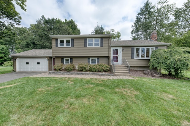 18 Black Birch Rd, Plainville, CT 06062 - tri-level home featuring a garage, a chimney, driveway, and a front lawn