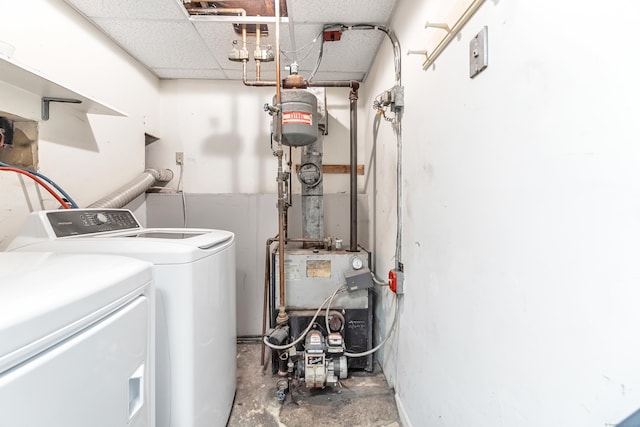 interior space featuring washing machine and dryer and a heating unit