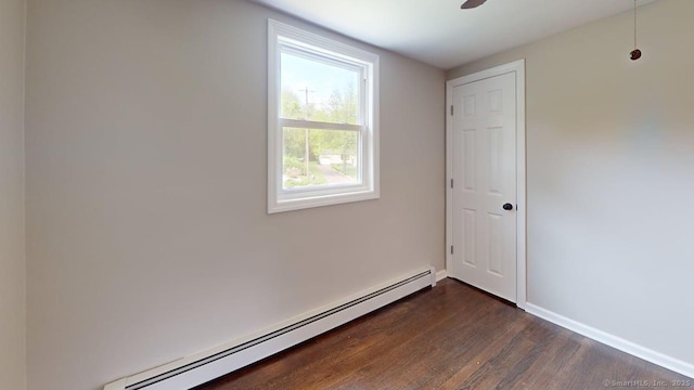 3 Richard Ln, Prospect, CT 06712 - spare room with baseboard heating, dark wood-style flooring, and baseboards