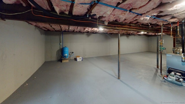 3 Richard Ln, Prospect, CT 06712 - unfinished below grade area featuring a water pressure tank and a heating unit