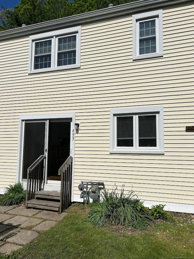 rear view of house with entry steps