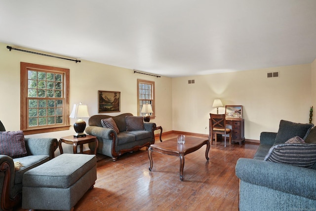 1069 Black Rock Tpke, Easton, CT 06612 - living area featuring visible vents, baseboards, wood finished floors, and a healthy amount of sunlight