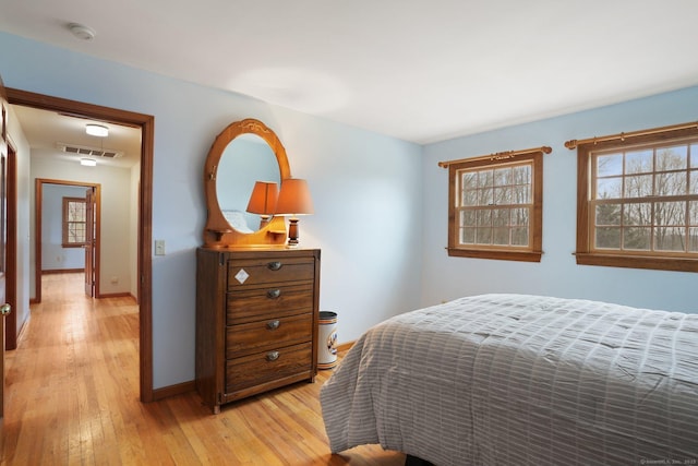 1069 Black Rock Tpke, Easton, CT 06612 - bedroom with visible vents, baseboards, light wood-type flooring, and multiple windows