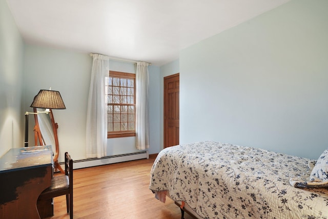 1069 Black Rock Tpke, Easton, CT 06612 - bedroom featuring light wood-type flooring and a baseboard radiator