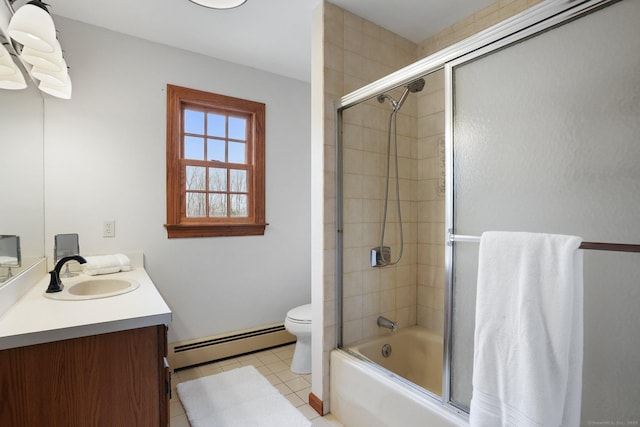 1069 Black Rock Tpke, Easton, CT 06612 - bathroom featuring combined bath / shower with glass door, a baseboard heating unit, toilet, vanity, and tile patterned flooring