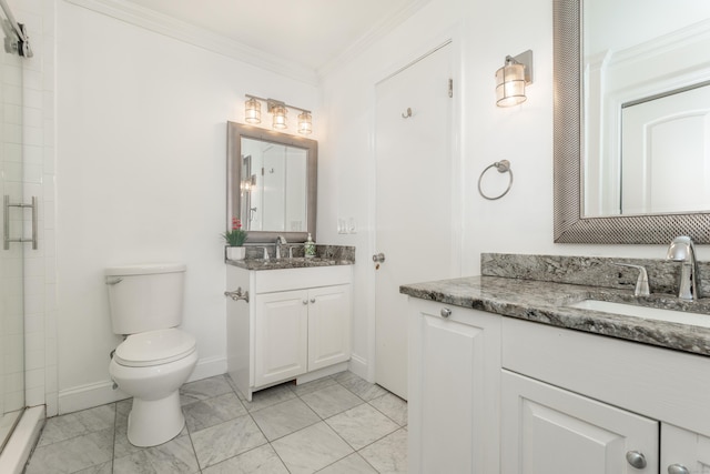 bathroom with a shower stall, toilet, a sink, and ornamental molding