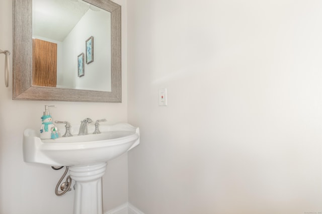 bathroom featuring baseboards