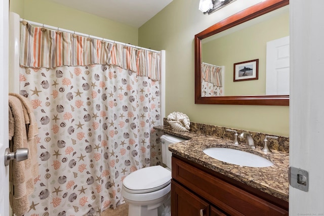 full bath with toilet, vanity, and a shower with shower curtain