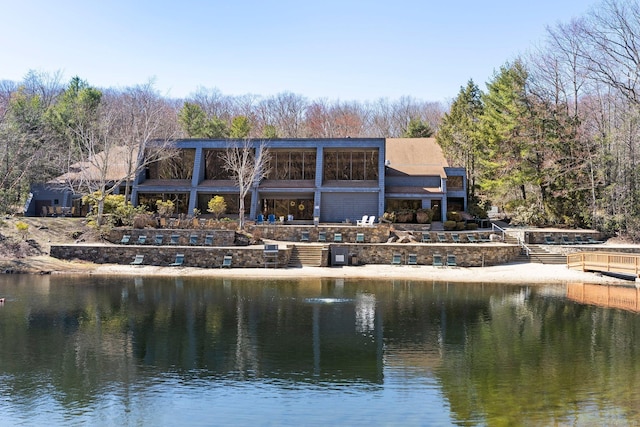 exterior space with a water view
