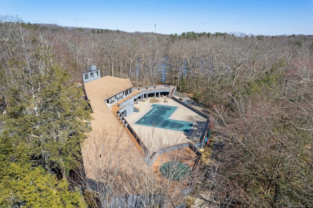 aerial view with a wooded view