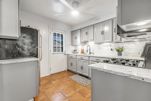 161 Boswell St, Stratford, CT 06615 - kitchen with ceiling fan, gray cabinets, gas stove, a sink, and backsplash