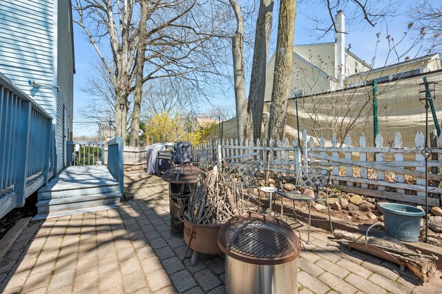 61 Harrington St, Meriden, CT 06451 - view of patio featuring fence