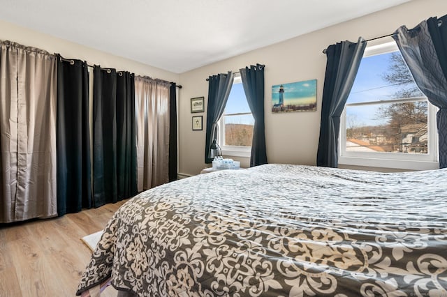 61 Harrington St, Meriden, CT 06451 - bedroom with multiple windows and wood finished floors