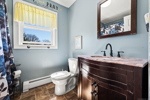 61 Harrington St, Meriden, CT 06451 - full bathroom with vanity, a baseboard heating unit, and toilet