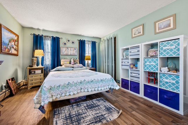 61 Harrington St, Meriden, CT 06451 - bedroom featuring wood finished floors and a textured ceiling