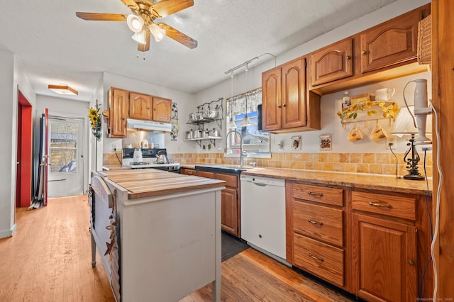 61 Harrington St, Meriden, CT 06451 - kitchen featuring range with gas stovetop, under cabinet range hood, ceiling fan, dishwasher, and a sink