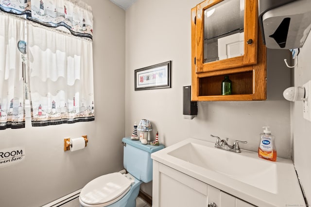 61 Harrington St, Meriden, CT 06451 - bathroom with vanity, a baseboard radiator, and toilet