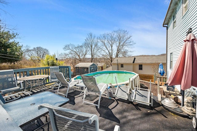 61 Harrington St, Meriden, CT 06451 - view of pool featuring a storage shed, an outdoor structure, and a patio