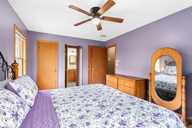 bedroom with visible vents and a ceiling fan