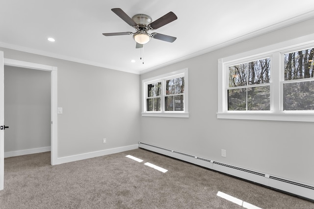 carpeted empty room featuring crown molding, ceiling fan, recessed lighting, baseboards, and a baseboard heating unit