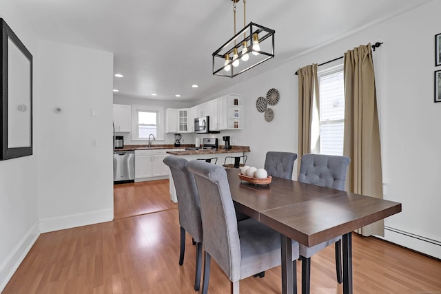 15 Smith St, Danbury, CT 06810 - dining room with an inviting chandelier, light wood finished floors, and recessed lighting