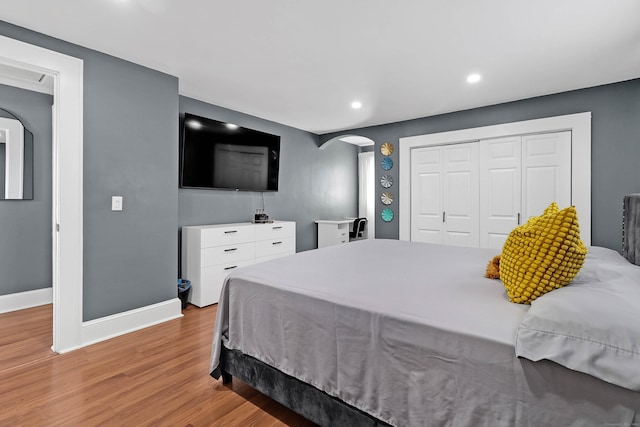 15 Smith St, Danbury, CT 06810 - bedroom with recessed lighting, light wood finished floors, arched walkways, a closet, and baseboards