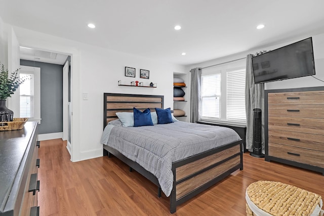 15 Smith St, Danbury, CT 06810 - bedroom with attic access, baseboards, recessed lighting, and light wood-style floors