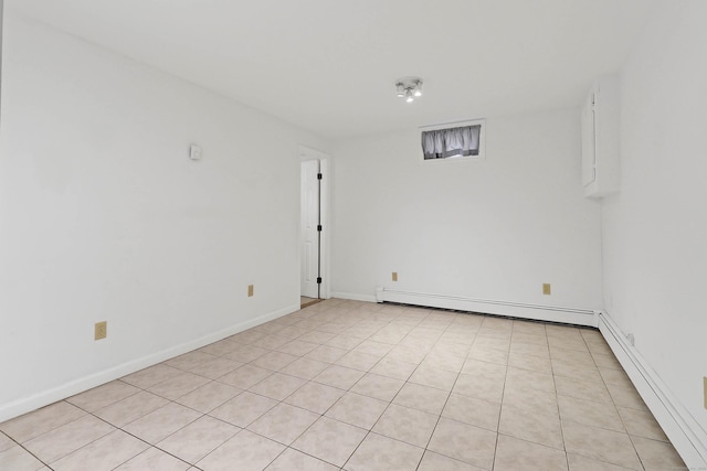 15 Smith St, Danbury, CT 06810 - spare room featuring a baseboard radiator, baseboards, and light tile patterned floors