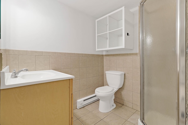 15 Smith St, Danbury, CT 06810 - bathroom with a shower stall, tile patterned flooring, vanity, tile walls, and baseboard heating