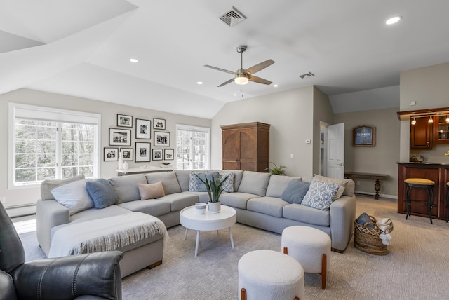 living room with a ceiling fan, visible vents, vaulted ceiling, a baseboard radiator, and recessed lighting