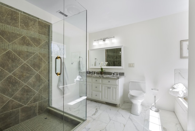 full bathroom with double vanity, toilet, a shower stall, and marble finish floor
