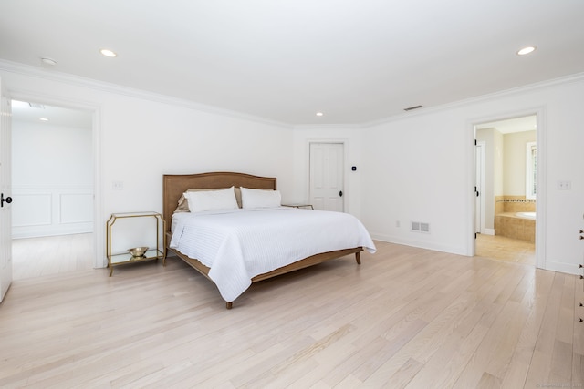 bedroom with light wood-style floors, ornamental molding, visible vents, and recessed lighting