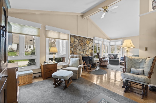 33 Cottage Ln, East Lyme, CT 06357 - interior space featuring ceiling fan, a wood stove, wood finished floors, high vaulted ceiling, and beamed ceiling
