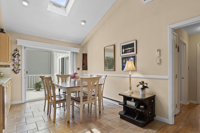 33 Cottage Ln, East Lyme, CT 06357 - dining space featuring recessed lighting, baseboards, a baseboard heating unit, and lofted ceiling with skylight