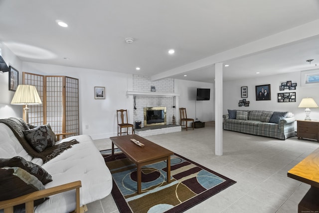 33 Cottage Ln, East Lyme, CT 06357 - tiled living room with a fireplace and recessed lighting