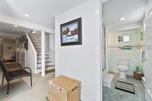 33 Cottage Ln, East Lyme, CT 06357 - hallway featuring stairway, a baseboard heating unit, recessed lighting, and light tile patterned flooring