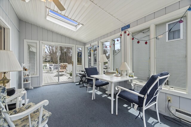 33 Cottage Ln, East Lyme, CT 06357 - sunroom with vaulted ceiling with skylight, carpet, and a baseboard heating unit