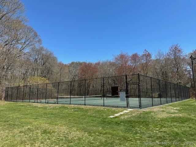 33 Cottage Ln, East Lyme, CT 06357 - view of tennis court featuring a yard and fence