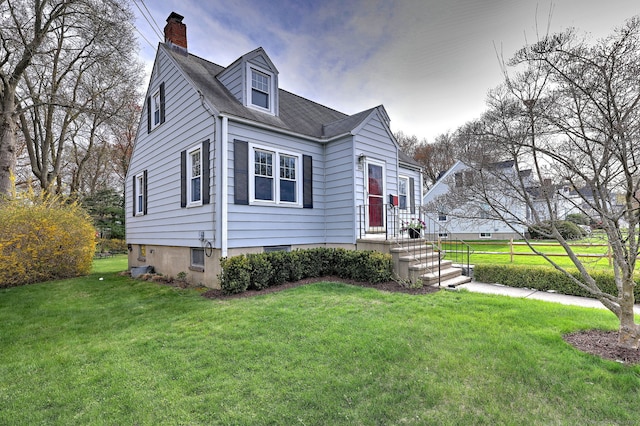 new england style home featuring a chimney