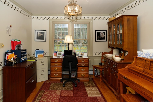 home office with an inviting chandelier, crown molding, dark wood-style floors, and wainscoting