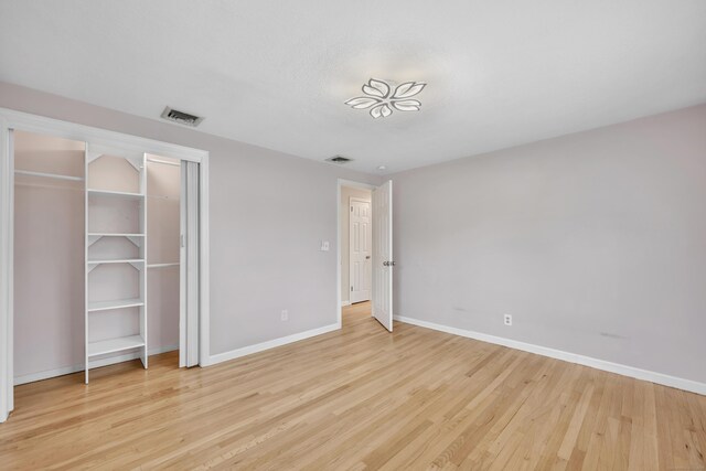 120 Newton St, Berlin, CT 06037 - unfurnished bedroom featuring light wood-style flooring, visible vents, and baseboards