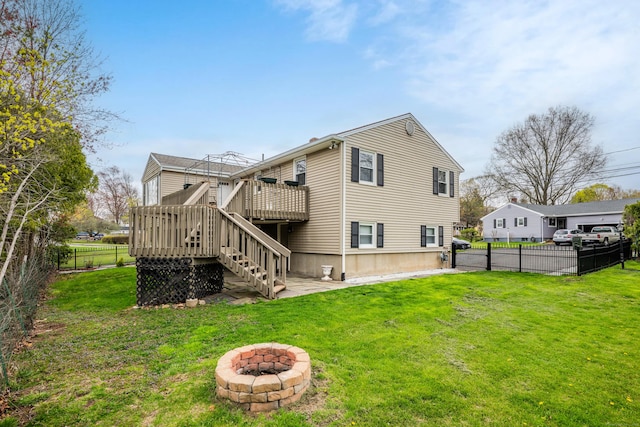 120 Newton St, Berlin, CT 06037 - rear view of house with a lawn, a fire pit, a fenced backyard, a wooden deck, and stairs