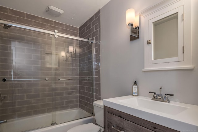 full bath with toilet, enclosed tub / shower combo, visible vents, and vanity