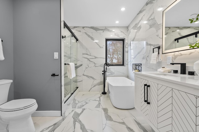 35 Bayberry Ln, Guilford, CT 06437 - bathroom featuring a marble finish shower, vanity, marble finish floor, a freestanding bath, and toilet