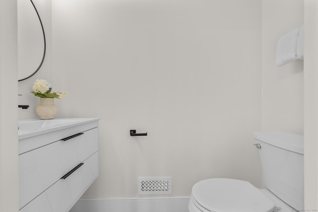 35 Bayberry Ln, Guilford, CT 06437 - bathroom with toilet, vanity, and visible vents