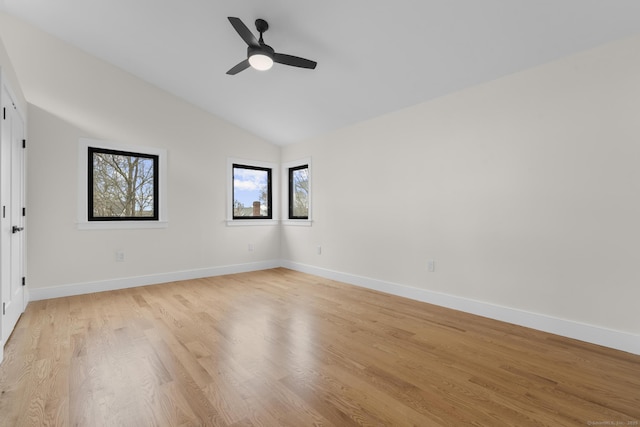 35 Bayberry Ln, Guilford, CT 06437 - empty room featuring baseboards, a ceiling fan, vaulted ceiling, and light wood-type flooring